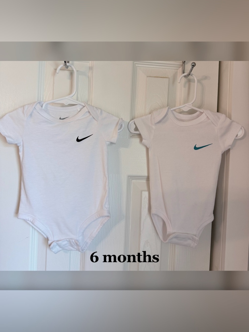 Nike White Baby One-Piece Bodysuits with Black and Teal Swooshes